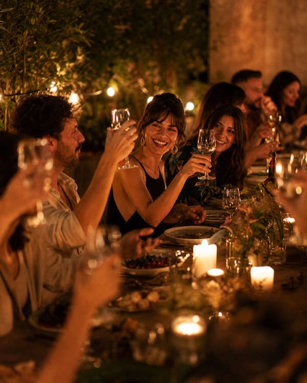 People sharing an intimate dinner experience